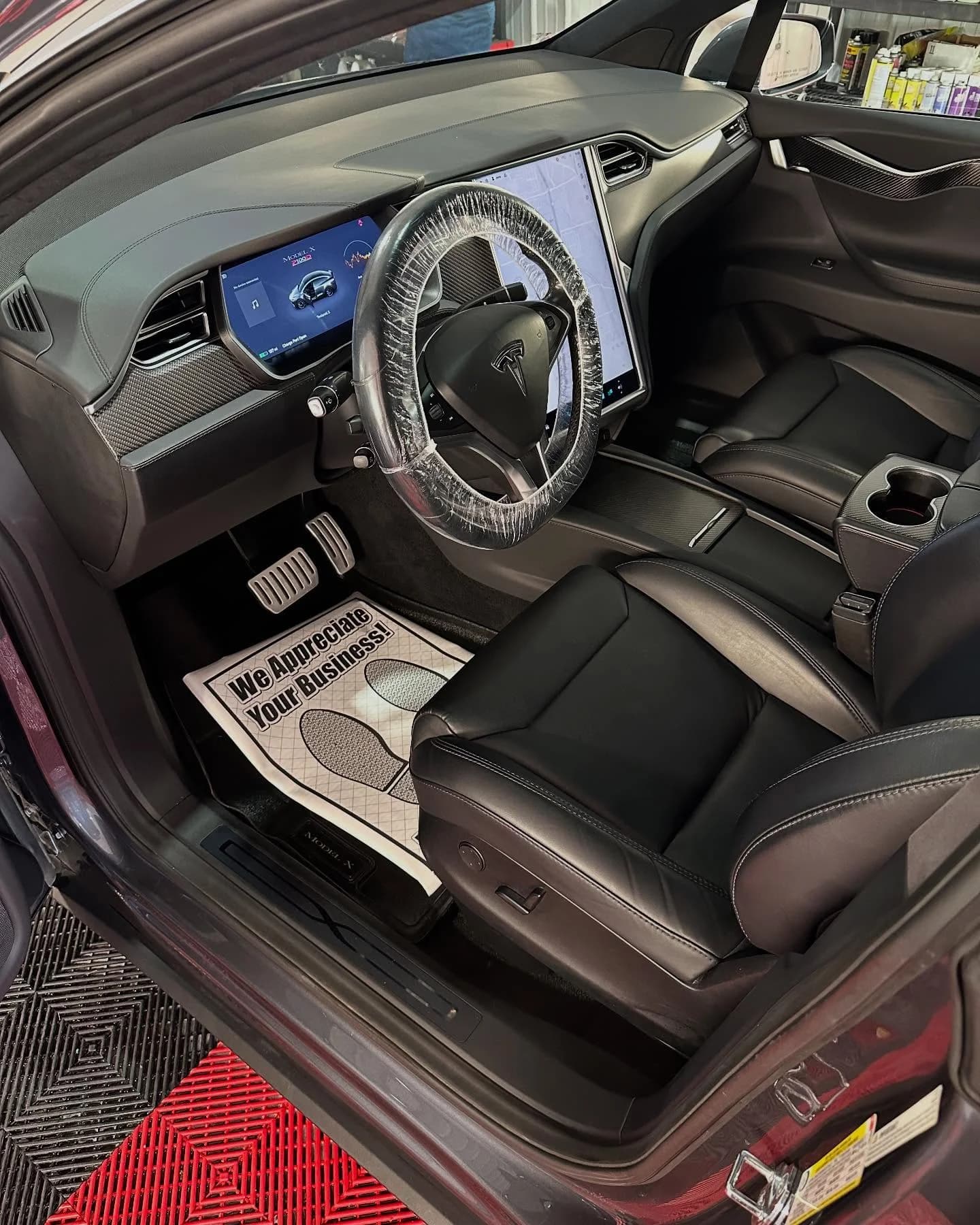 Clean Tesla Model X front cabin after interior detailing