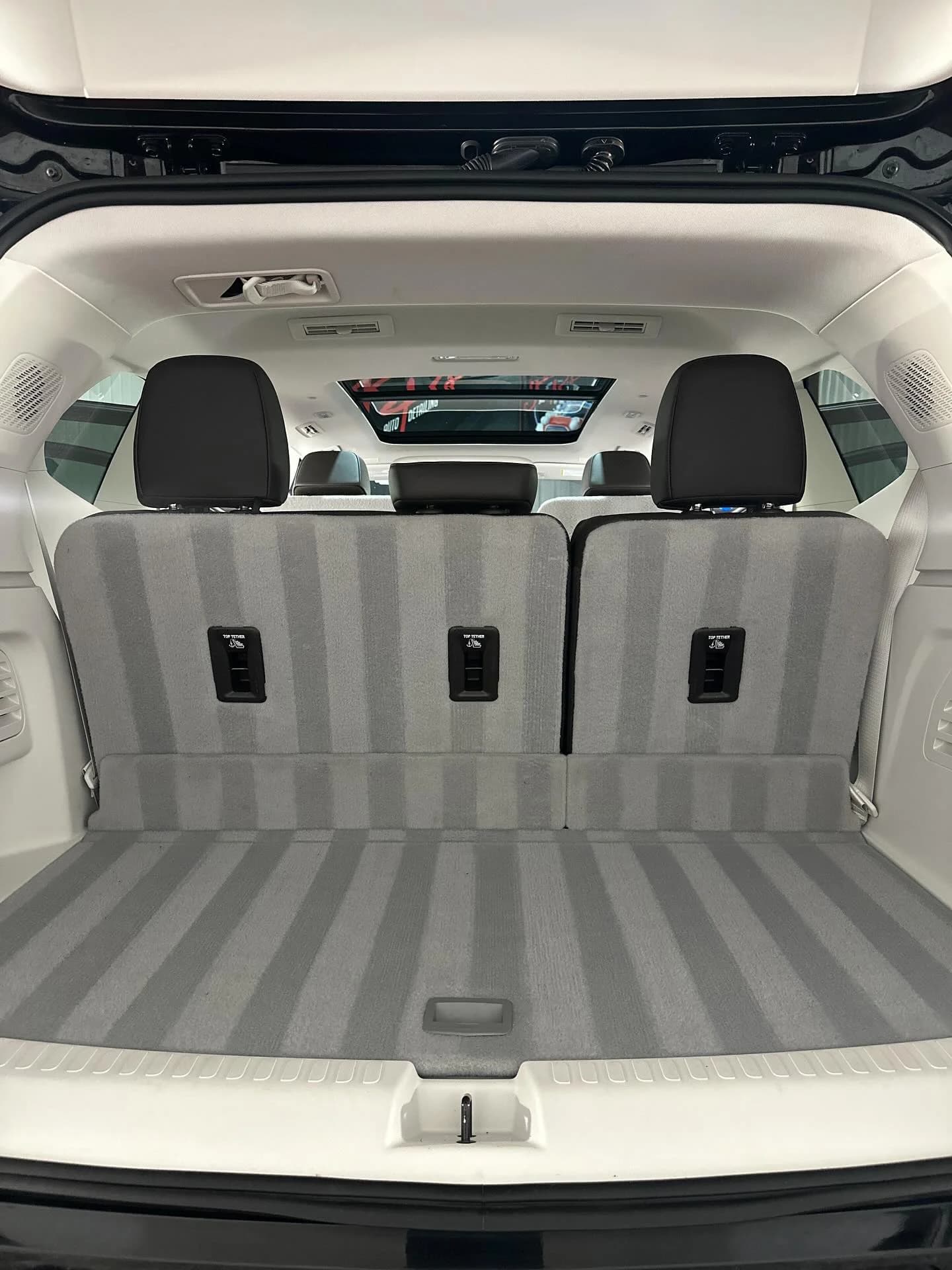 Clean GMC Acadia cargo area after interior detailing