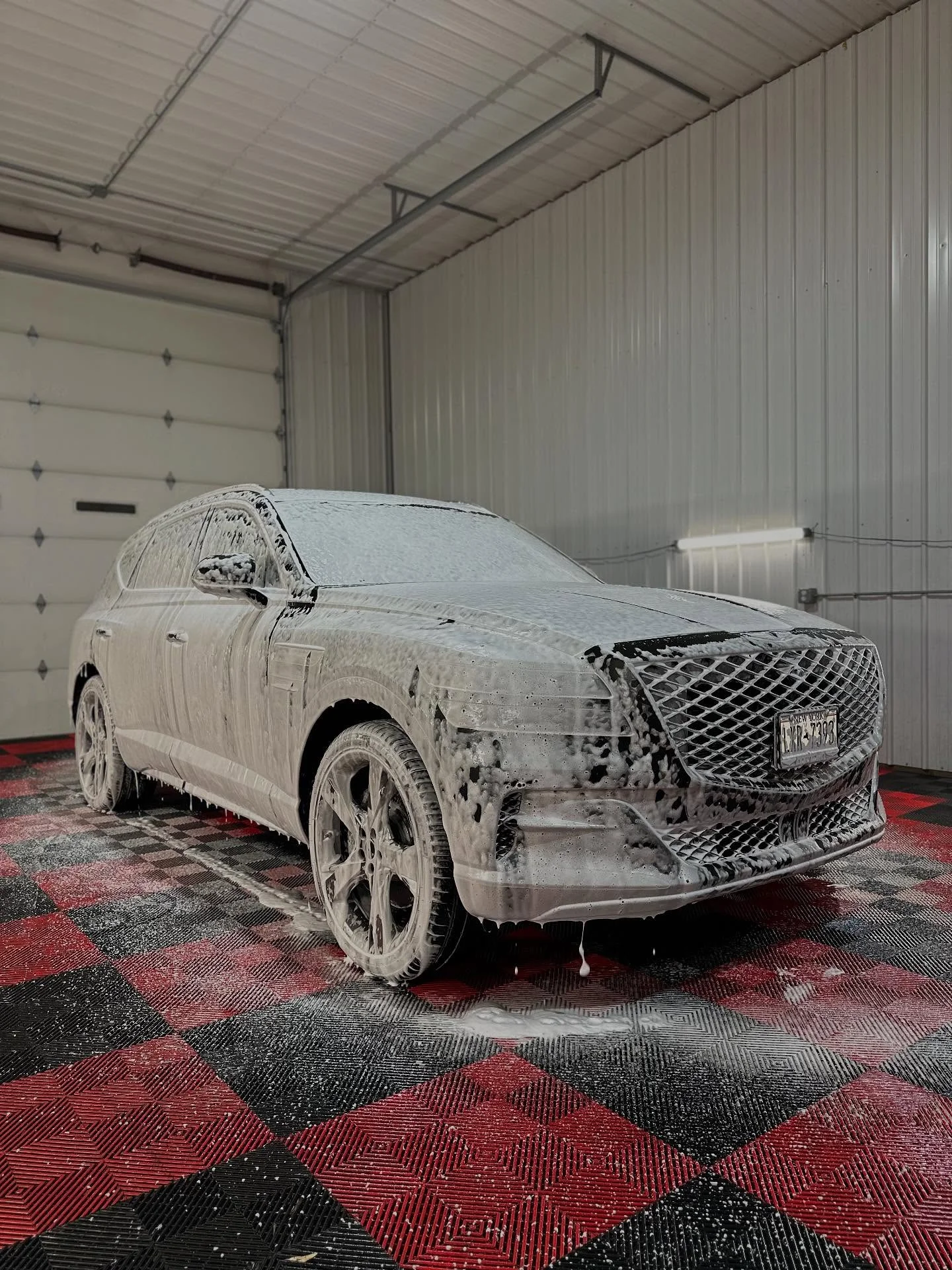 Professional vehicle foam wash before multi-stage paint correction Buffalo NY