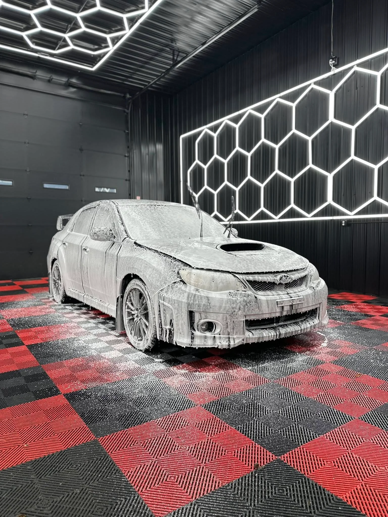 Subaru WRX STI before salt removal Buffalo NY - winter road salt damage